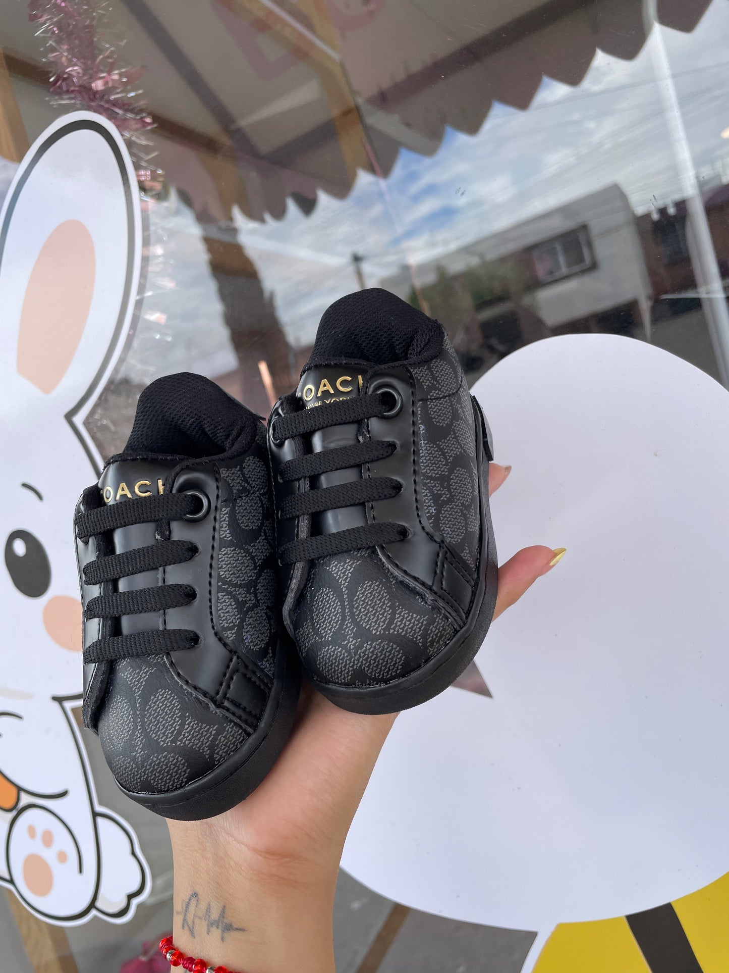 Tenis coach negros